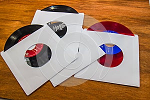 Vintage 45 rpm Records With White Sleeves