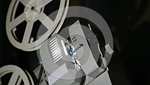 Vintage 8 Mm Movie Projector And Film Reel Closeup