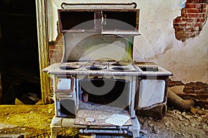 Vintage Abandoned Stove in Derelict Interior, Eye-Level View