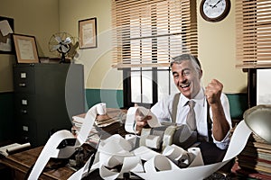 Vintage accountant giving good news photo