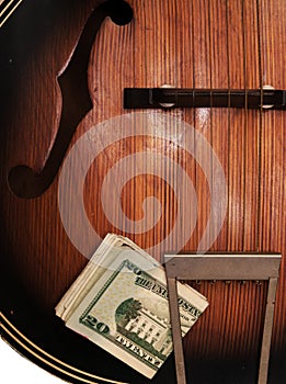 Vintage Acoustic Guitar And Money