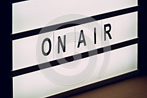 Vintage On Air live broadcast sign