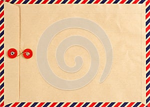 Vintage airmail envelope. paper background photo