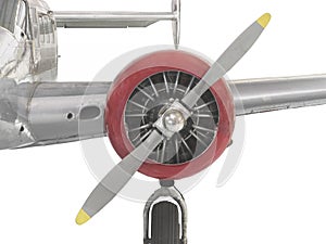 Vintage airplane engine, propeller, and wing isola