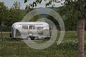 Vintage Airstream Caravan in a green park