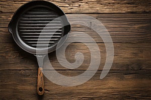 Vintage allure Empty grill pan on a rustic oak table