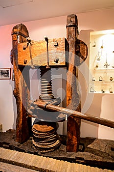 Vintage Ancient italian olive oil machine used to make oil, oil mill