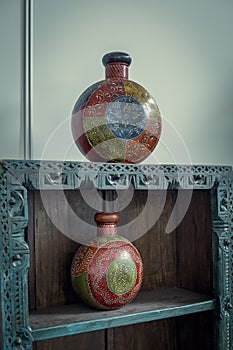 Vintage antique asian vase on a wooden table