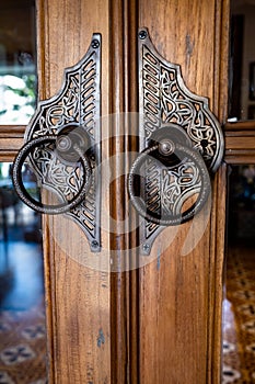 Vintage and antique Javanese butterfly door handle