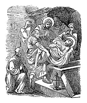Vintage Antique Religious Biblical Drawing or Engraving of Burial of Jesus, Joseph of Arimathea is Placing His Body in a photo