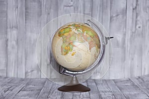 Vintage / antique / retro terrestrial globe showing both sides of the world - America and Europe as well as the African continent