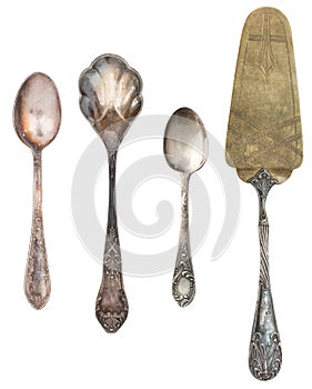 Vintage Antique silverware isolated on white background. Retro teaspoons, forks, knives, shovels for cake