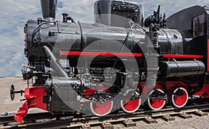 Vintage antique steam locomotive or train engine