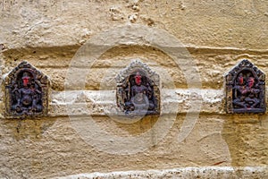 Vintage Antique Stone Carved Tablats outside the wall of Sree Gaya