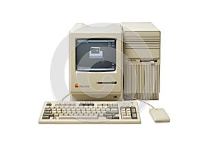 Vintage apple macintosh computer system with keyboard and mouse
