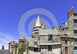 Vintage architecture of Old Town with Chateau de Vitre in background - Vitre, France