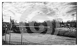 Vintage areal shot of the Satchel Paige stadium KCMO with a waving American flag