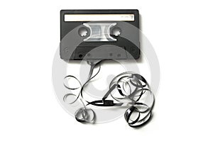 vintage audio cassette with magnetic band outside on