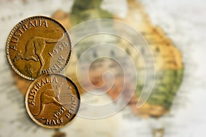Vintage Australian Coins over Map Background Retro effects