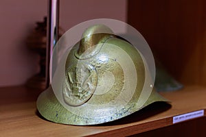 Vintage authentic firefighter helmet with selective focus. Background with copy space