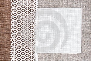 Vintage background with canvas on lace fabric and burlap
