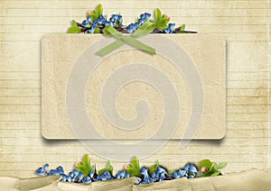Vintage background with card and blue flowers