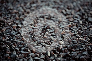 Vintage background of gravel. film grain. Texture of a wet road. One of a million. A special and outstanding object