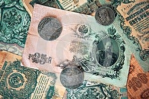 Vintage background, old Russian money - banknotes anf coins