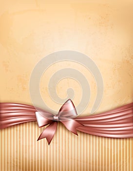 Vintage background with red gift bow and ribbon on