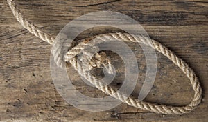 Vintage background with wooden log and hemp rope