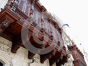 The vintage balcony of palace on Plaza de Armas, Plaza Mayor, Lima city, Peru, South America
