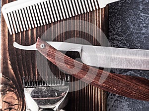 Vintage barber tools with straight razor