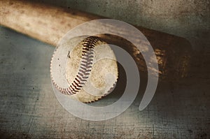 Vintage baseball bat and old ball