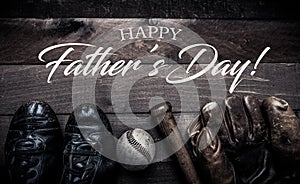 Vintage baseball gear on a wooden background with Father`s day greeting