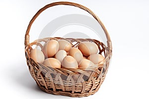 Vintage basket with many raw farm bio eggs over isolated backround