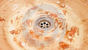 Vintage Beautiful faucet and golden mixer tap on a marble round sink in the bathroom. Interior of an expensive toilet with a