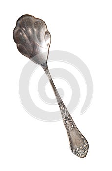 Vintage beautiful spoon isolated on a white background. Retro silverware