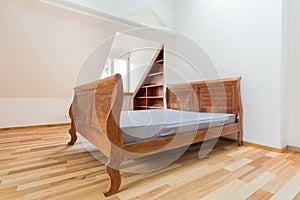 Vintage bed in the attic