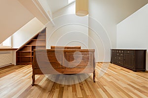 Vintage bed in the attic