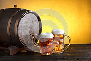 Vintage beer barrel with two beer glasses