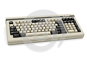 Vintage beige computer keyboard with a full numeric keypad and function keys