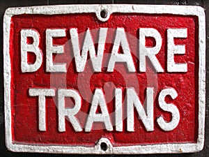Vintage beware trains enamel sign