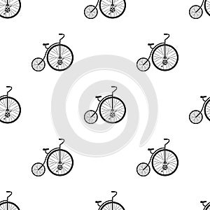 Vintage bicycle. The first bicycle. Huge and small wheel.Different Bicycle single icon in black style vector symbol