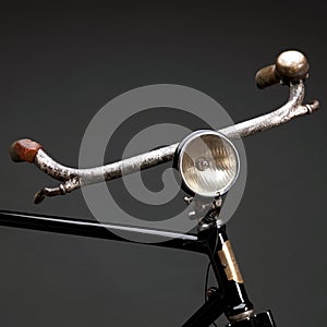 Vintage bicycle handlebar with headlight