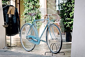 Vintage bicycle parked under the arcades