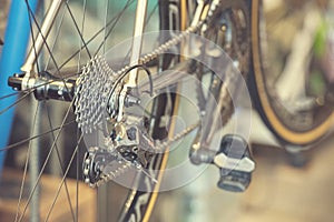 Vintage Bicycle part of bike cycle wheel interior Design with people lifestyle hobby in a modern city. Bicycle with sunlight