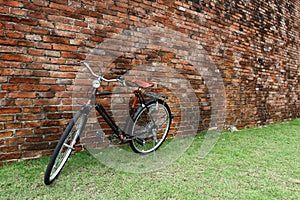 Vintage bicycle and red brick wall