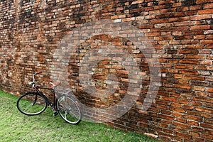 Vintage bicycle and red brick wall