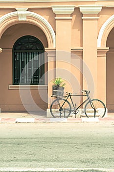 vintage bicycle on wall background