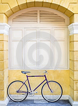 Vintage bicycle on Wall Window frame Hipster lifestyle